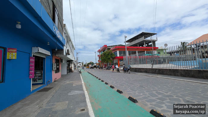 The red building is a "mall" in the town of Puerto Villamil, in Isla Isabela, Galapagos Islands.